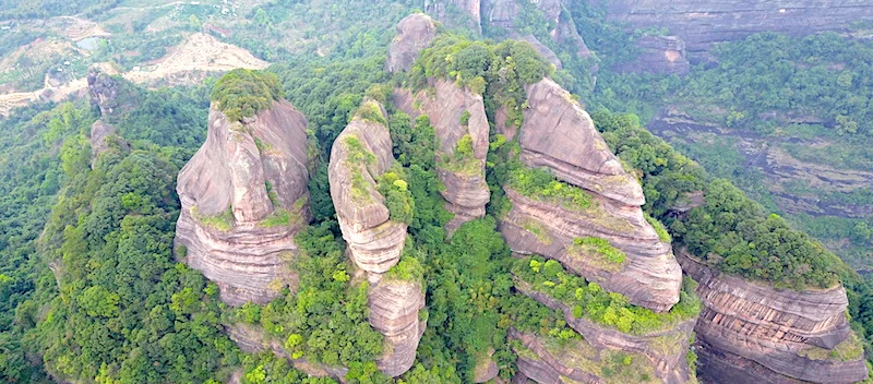 Areal photo, Danxia mountain, sandstone towers and trees