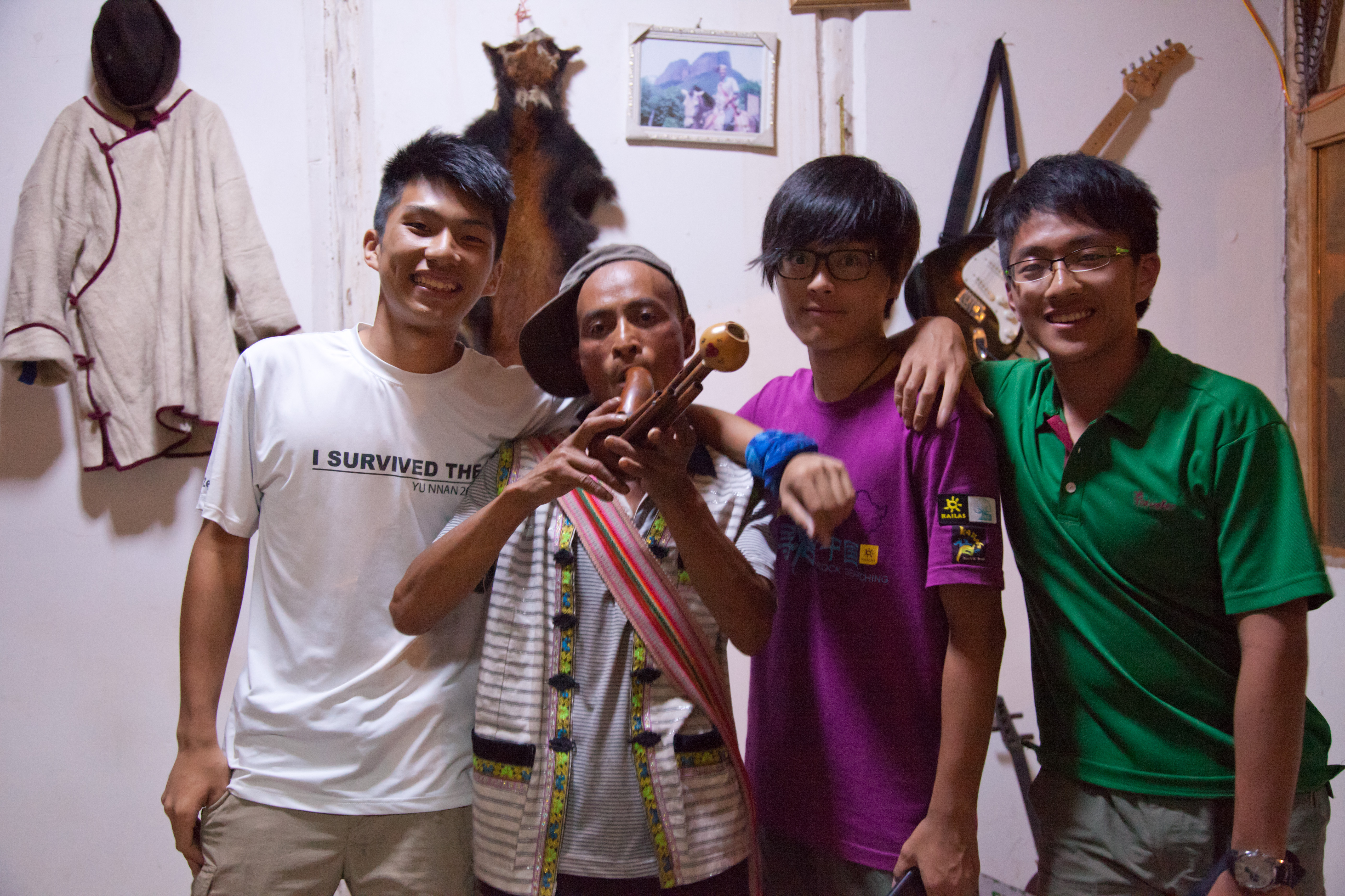 Lisu music teacher with students in Liming, China