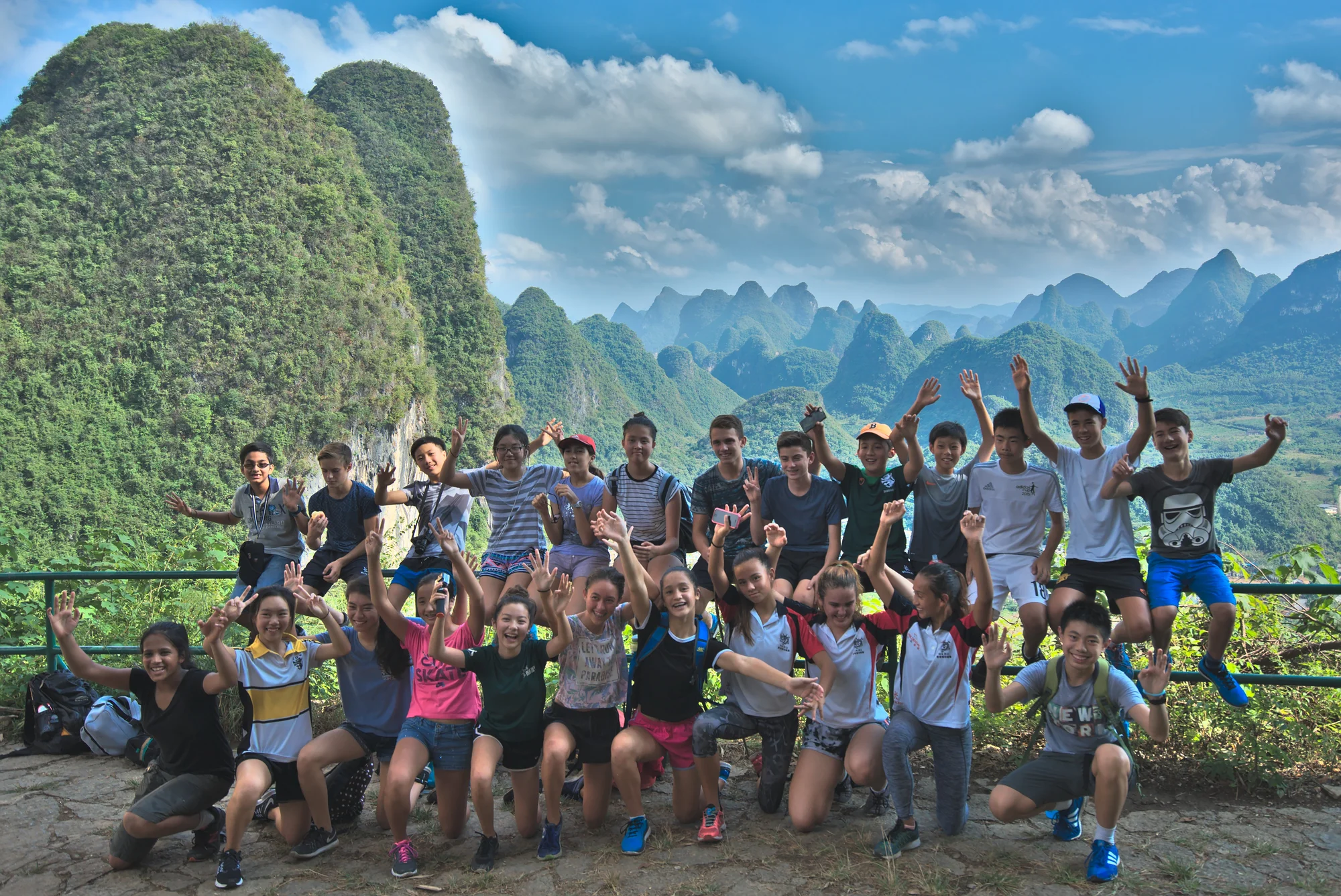 School group outdoor education, climbing moon hill in Yangshuo, China